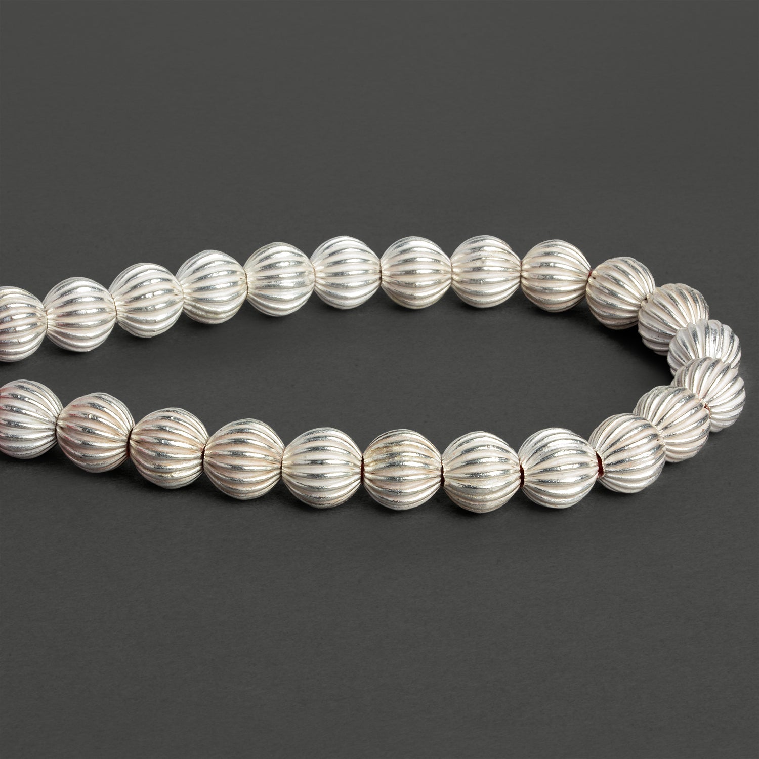 9mm Silver Plated Copper Corrugated Rounds 8 inch 23 beads - The Bead Traders