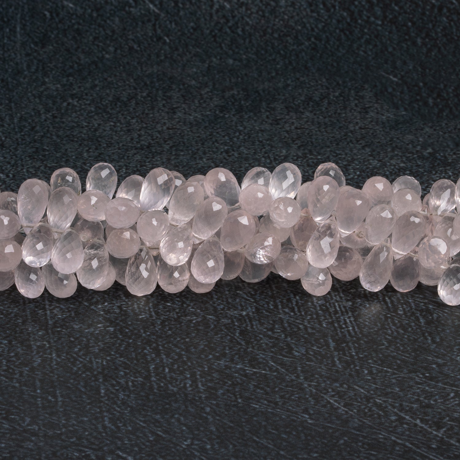 9x5mm Rose Quartz Faceted Teardrops 7.5 inch 75 beads - The Bead Traders