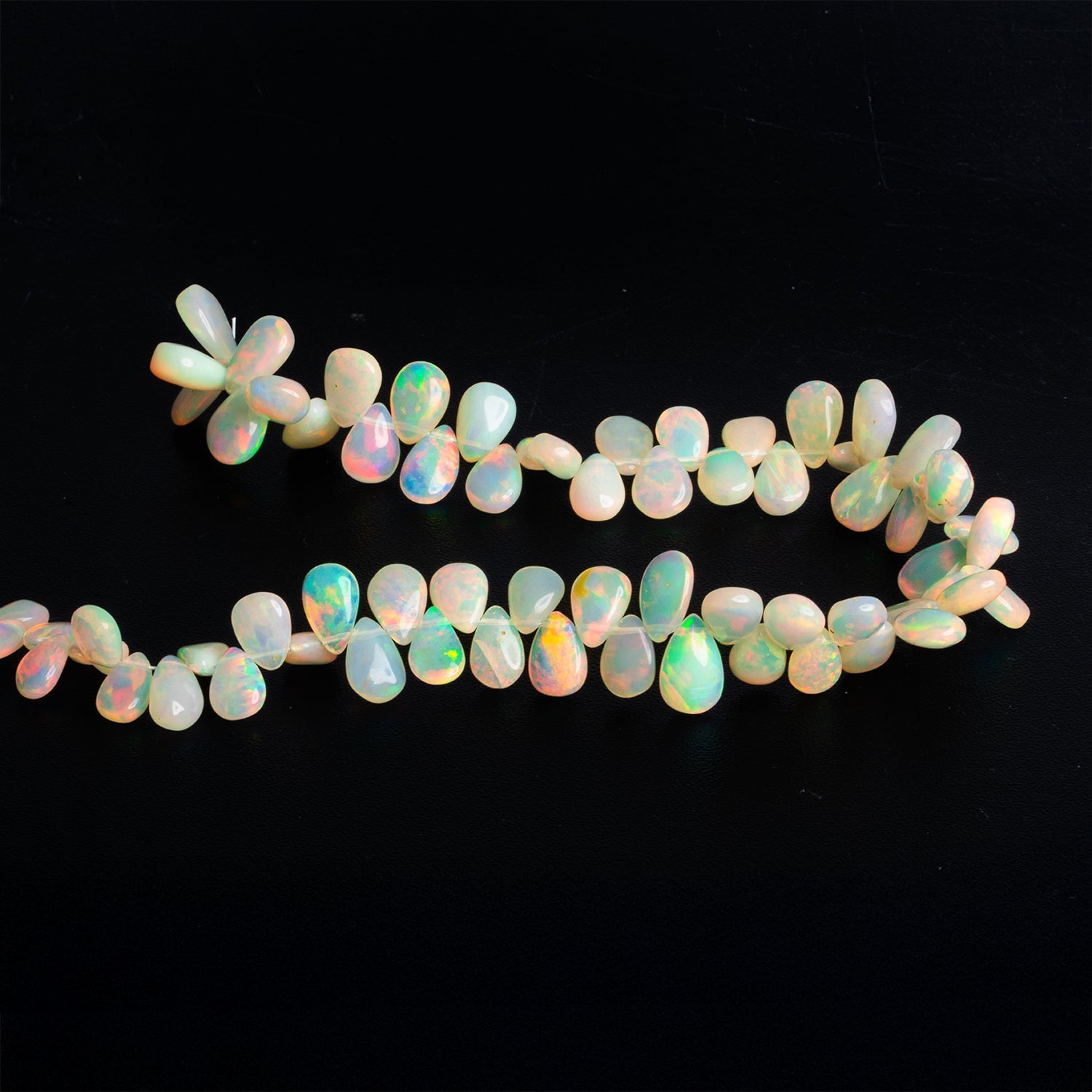9x6mm Ethiopian Opal Plain Pears 9 inch 67 beads - The Bead Traders