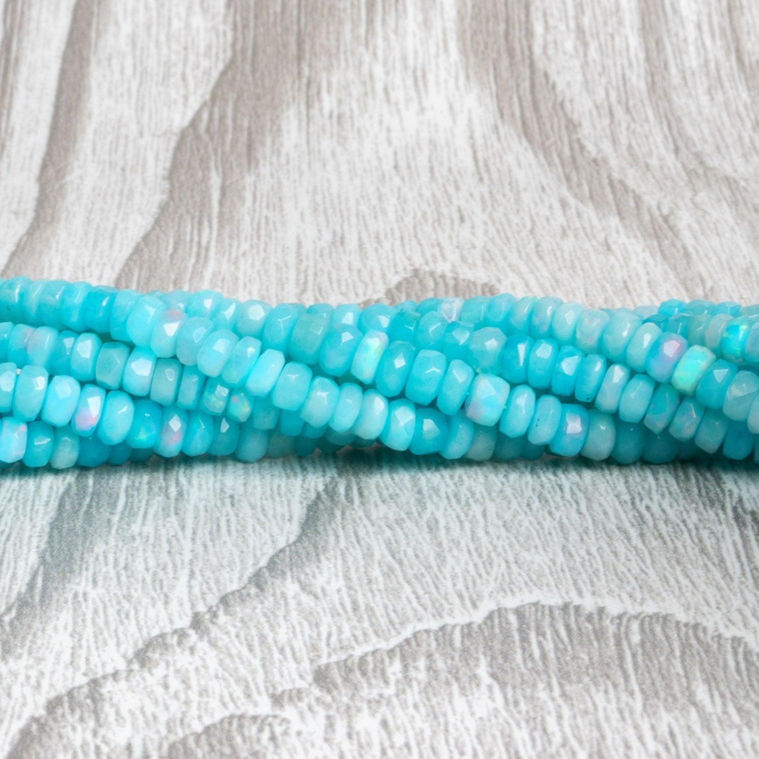 4mm Light Blue Ethiopian Opal Faceted Rondelles 15 inch 180 beads - The Bead Traders