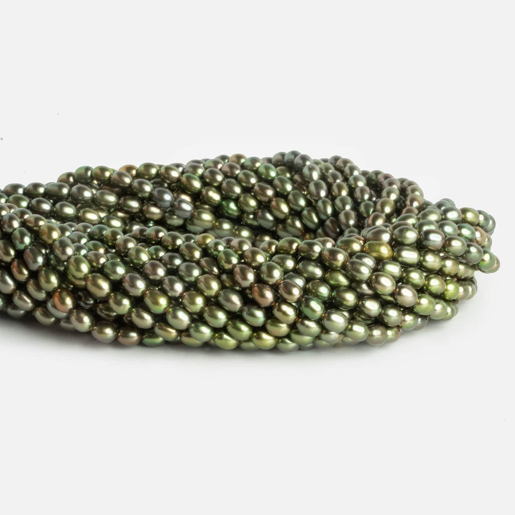 4x5mm Copper Green Oval Pearls 15 inch 63 beads - The Bead Traders