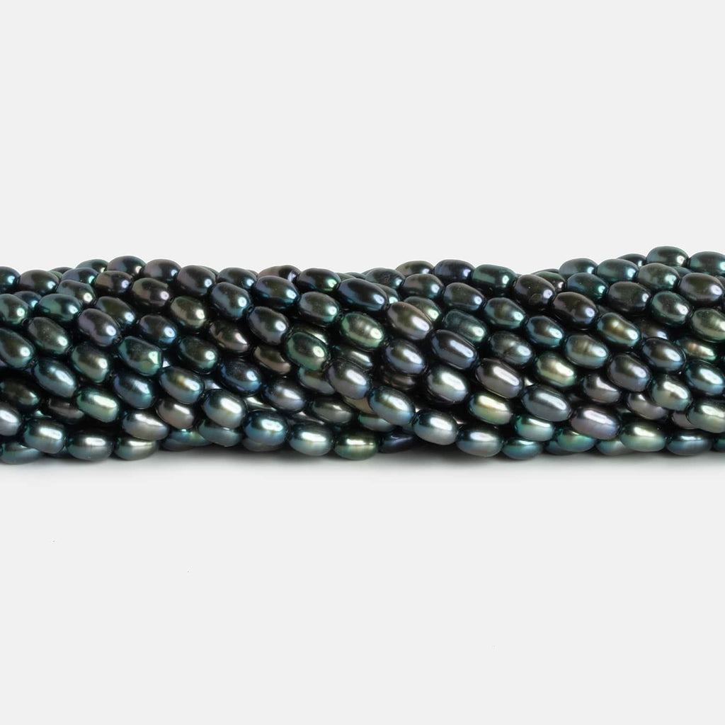 4x5mm Peacock Green Oval Pearls 15 inch 57 beads - The Bead Traders