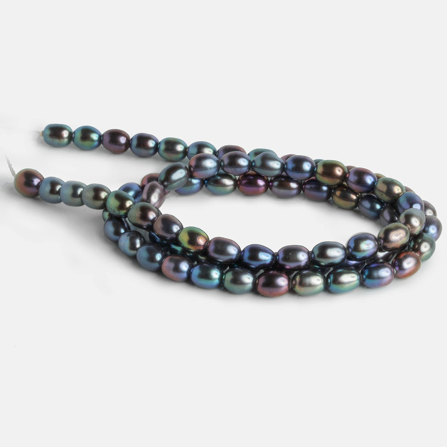 4x5mm Peacock Oval Pearls 15 inch 70 beads - The Bead Traders