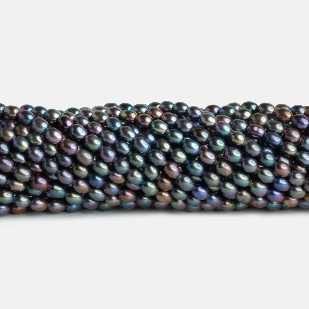4x5mm Peacock Oval Pearls 15 inch 70 beads - The Bead Traders