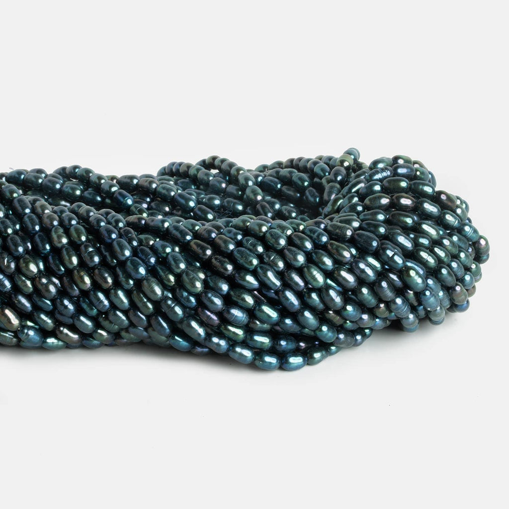 4x6mm Peacock Blue Oval Pearls 15 inch 57 beads - The Bead Traders