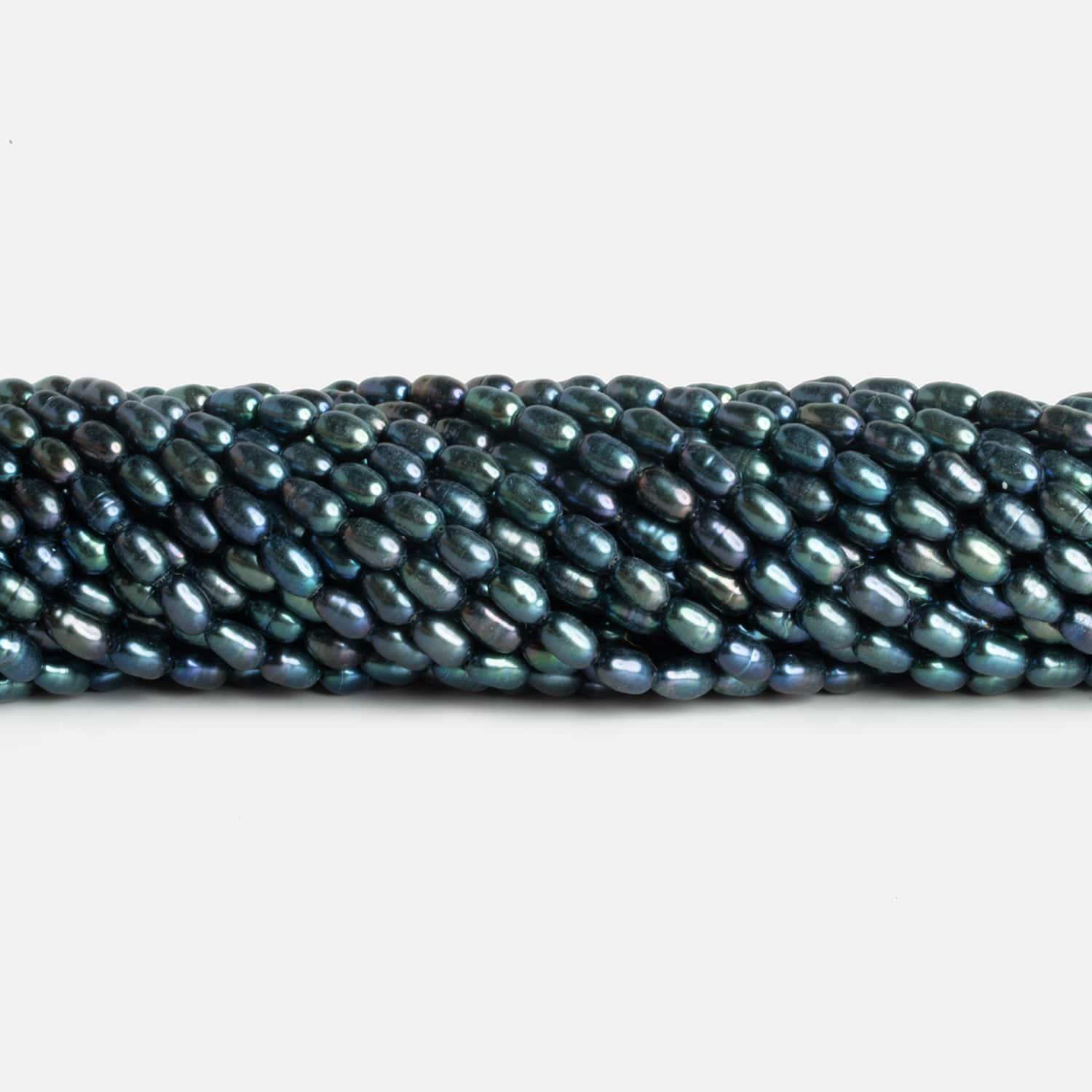 4x6mm Peacock Blue Oval Pearls 15 inch 57 beads - The Bead Traders