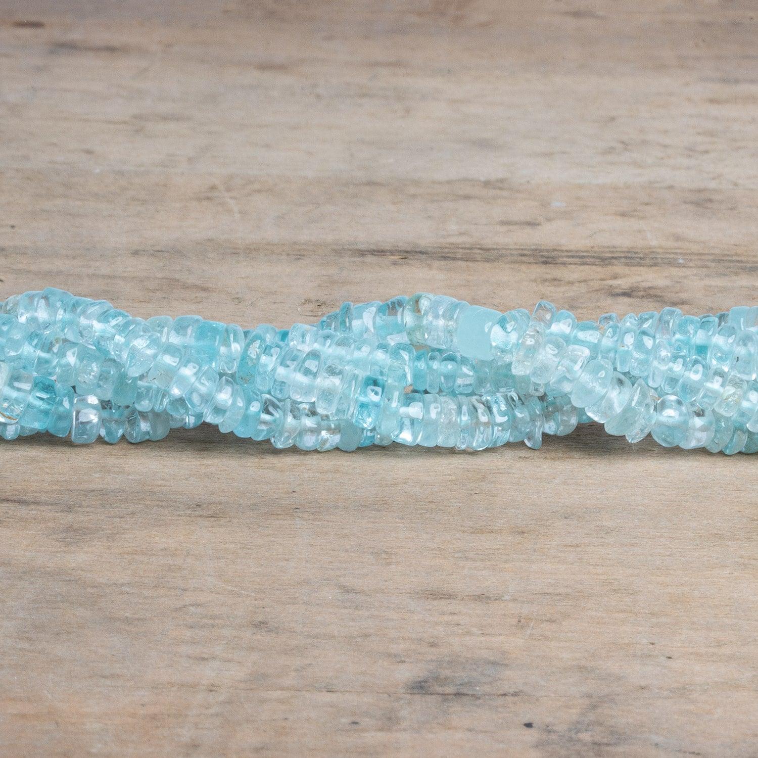 5-6mm Aquamarine Plain Heishi Beads 12 inch 150 pieces - The Bead Traders