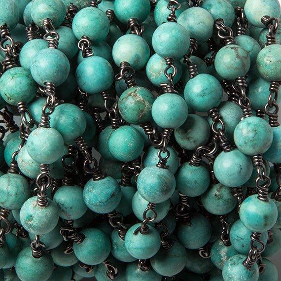 6mm Turquoise Magnesite round Black Gold Rosary Chain by the foot 25 beads - The Bead Traders