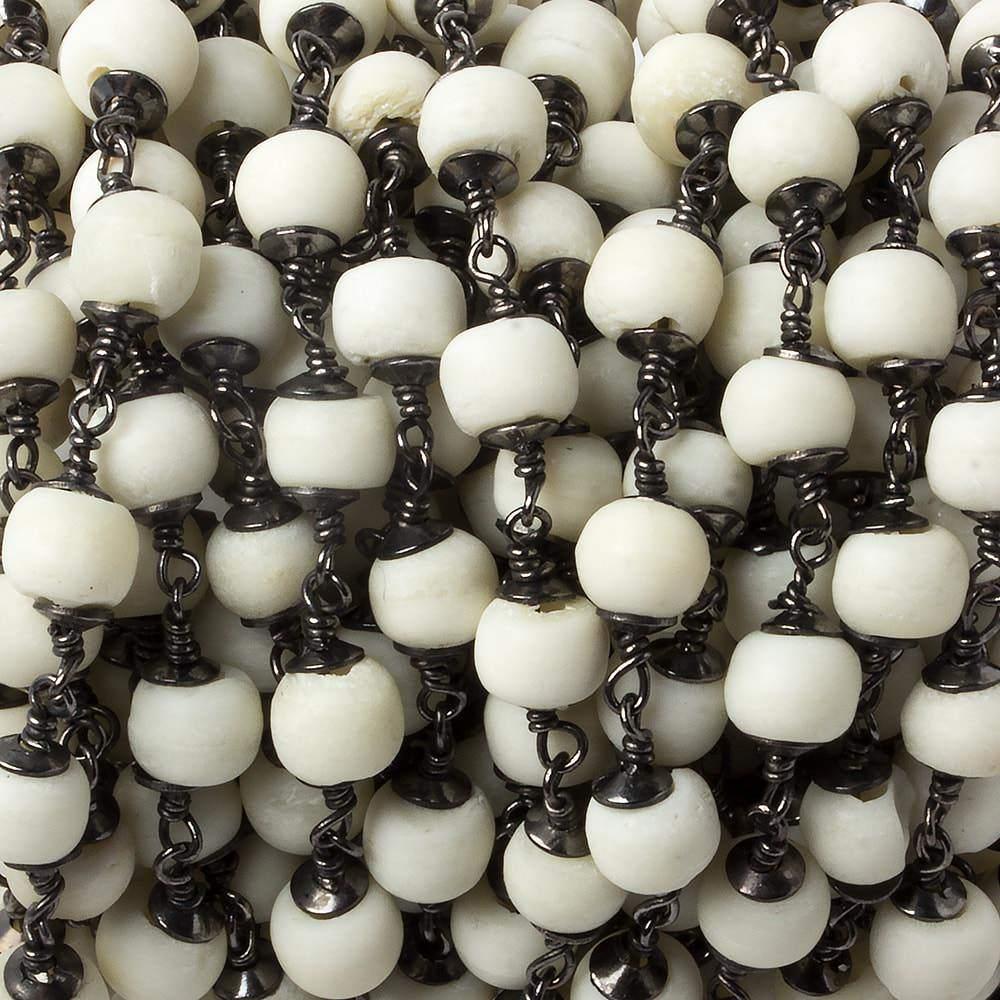 6mm White Ox Bone rounds Black Gold plated Cap and Chain by the foot 21 pcs - The Bead Traders
