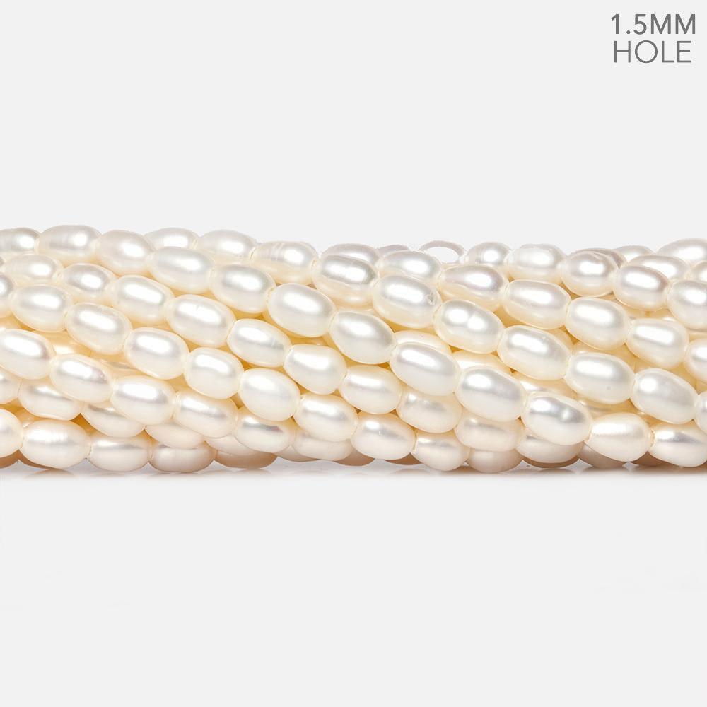 6x4mm Cream Large Hole Oval Freshwater Pearls 1.5mm drill hole 15 inch 62 pcs - The Bead Traders