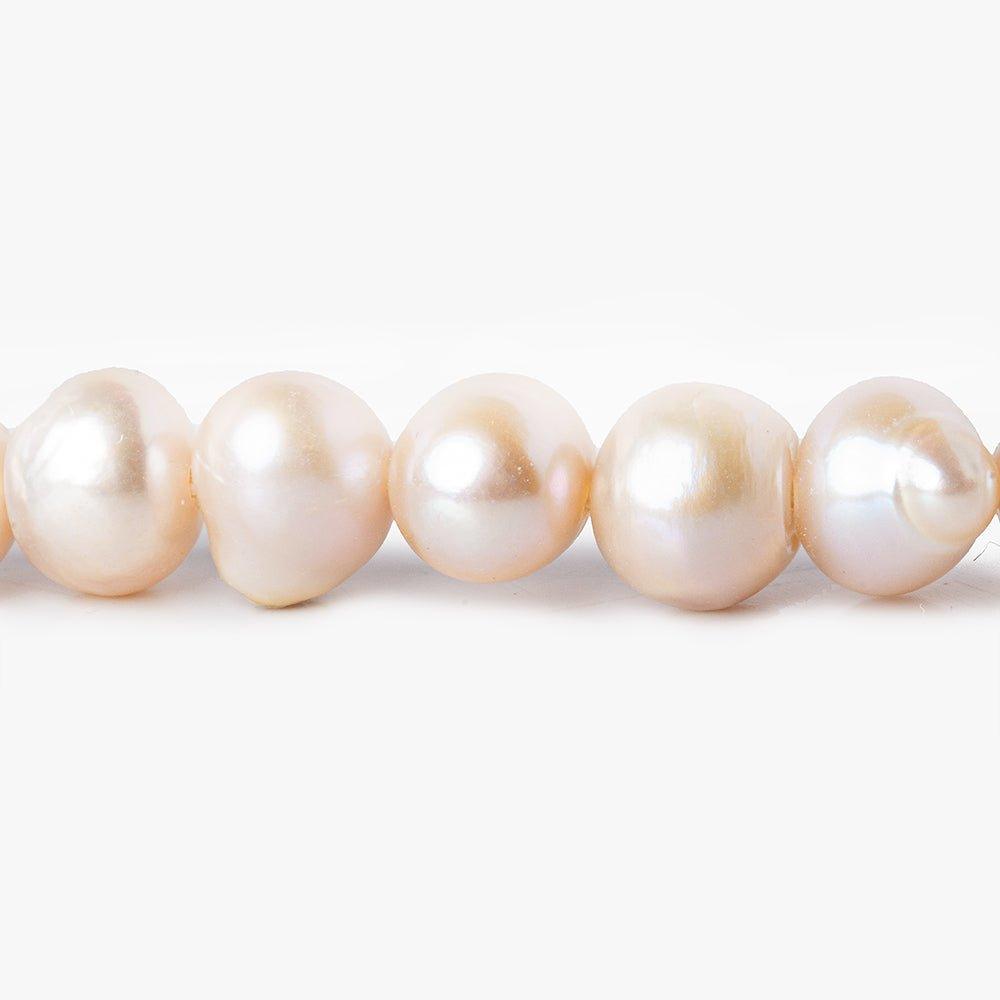 6x5mm - 7x6mm Pale Pink Baroque Freshwater Pearls 14 inch 60 beads - The Bead Traders