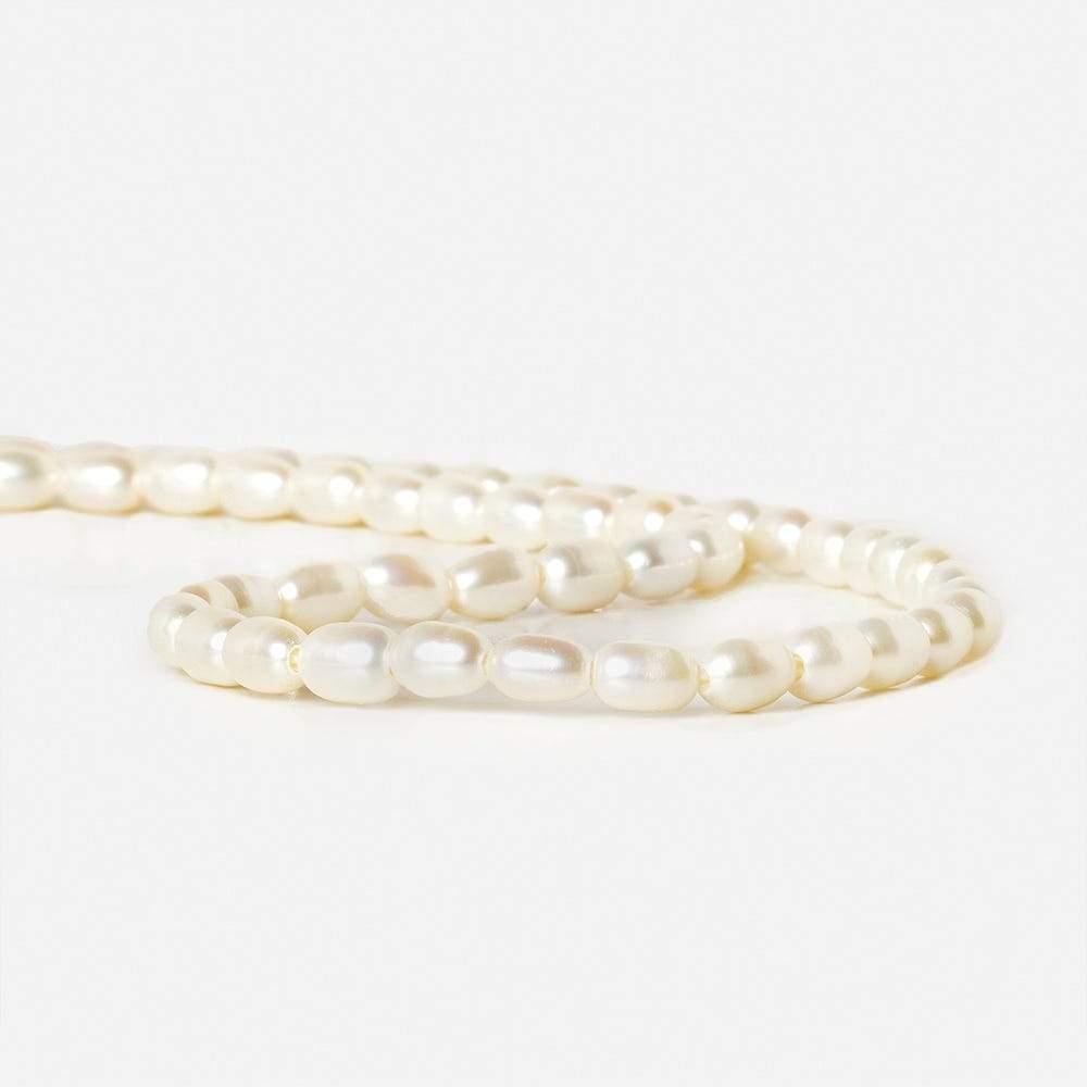 7-8 mm Cream Large Hole Oval Freshwater Pearls 16 inch 52 pieces - The Bead Traders