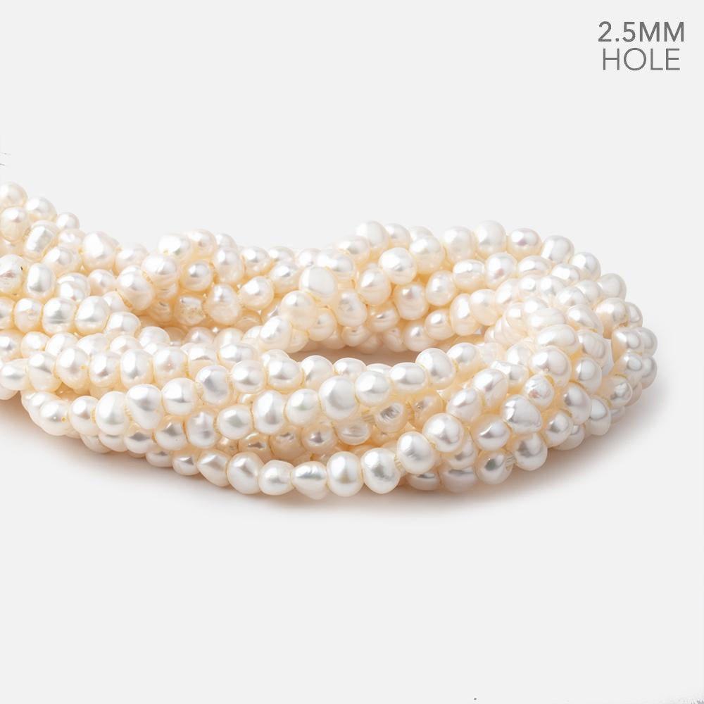 7-8mm Cream Baroque 2mm Large Hole Pearls 15 inch 63 pieces - The Bead Traders