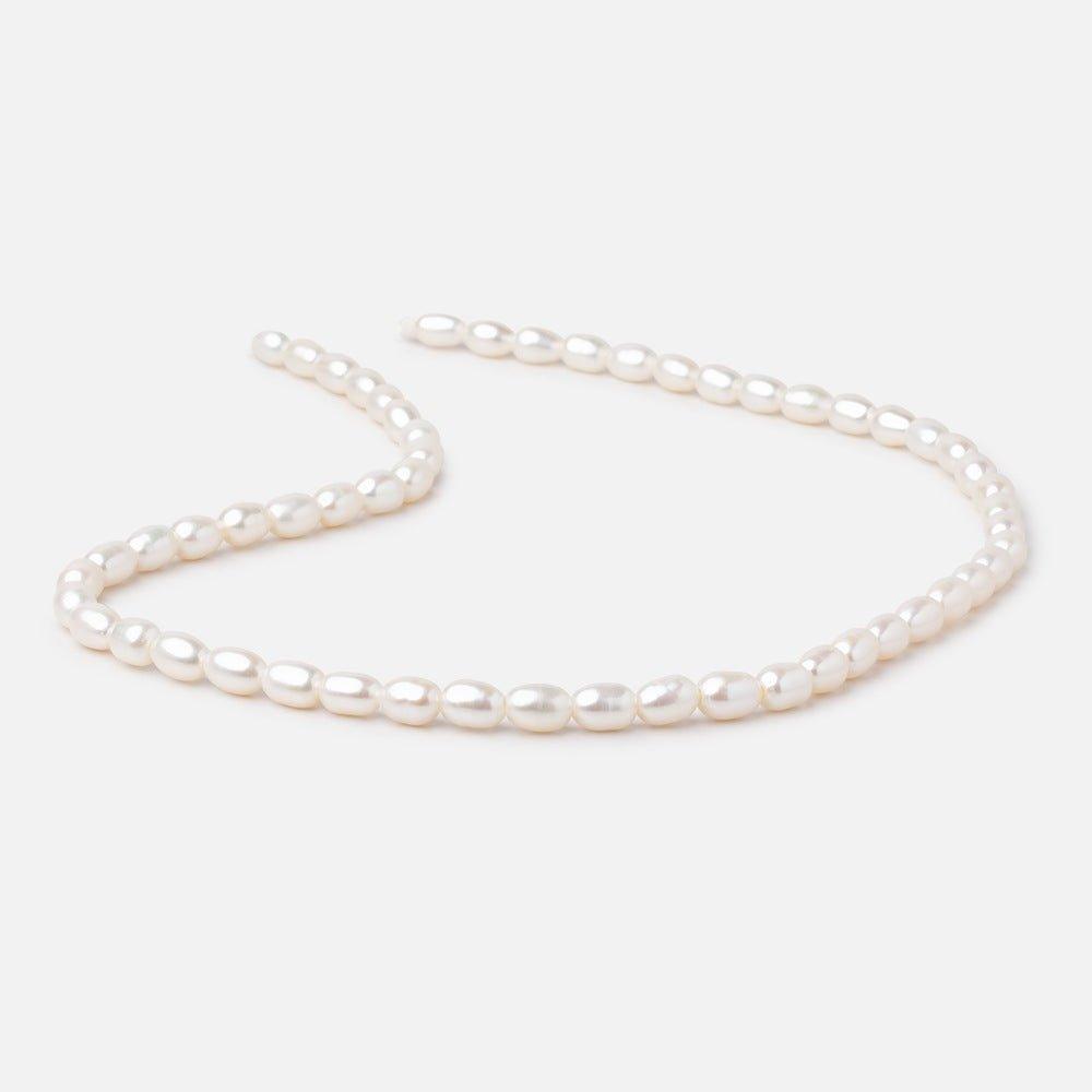 7x5mm Cream Oval Large Hole Freshwater Pearls 16 inch 56 pieces - The Bead Traders