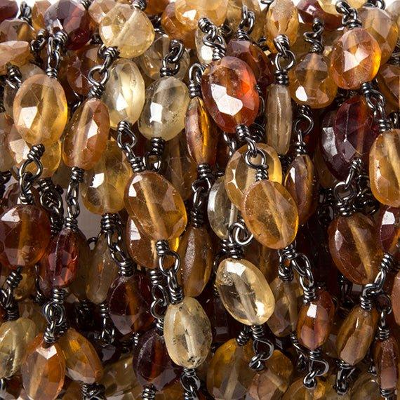 7x5mm Hessonite faceted oval Black Gold Rosary Chain by the foot 25 beads - The Bead Traders