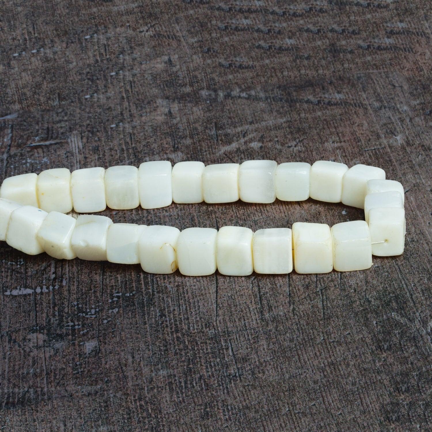 7x7-9x9mm White & Yellow Opal plain cubes 6.5 inch 46 Beads - The Bead Traders