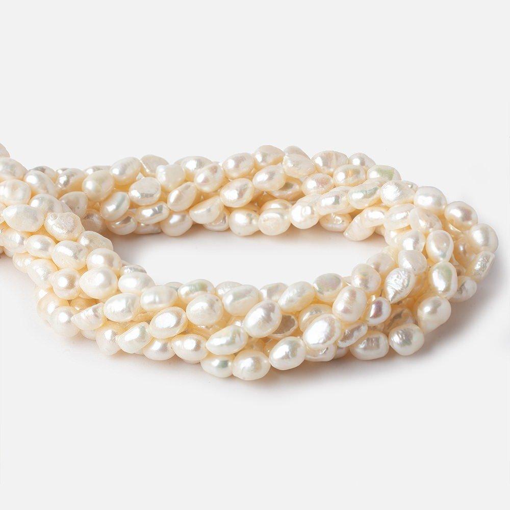 8x7mm-9x7mm Creamy White Straight Drill Baroque Freshwater Pearl 16 inch 44 pieces - The Bead Traders