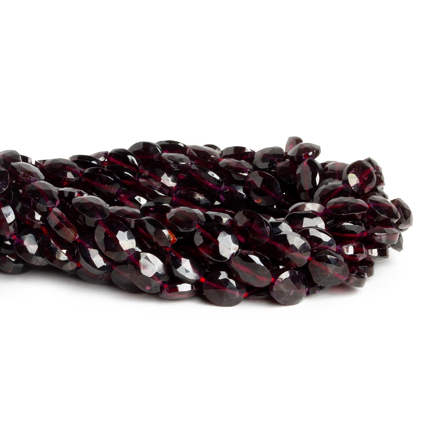 9x7mm Garnet Faceted Ovals 13 inch 35 beads - The Bead Traders