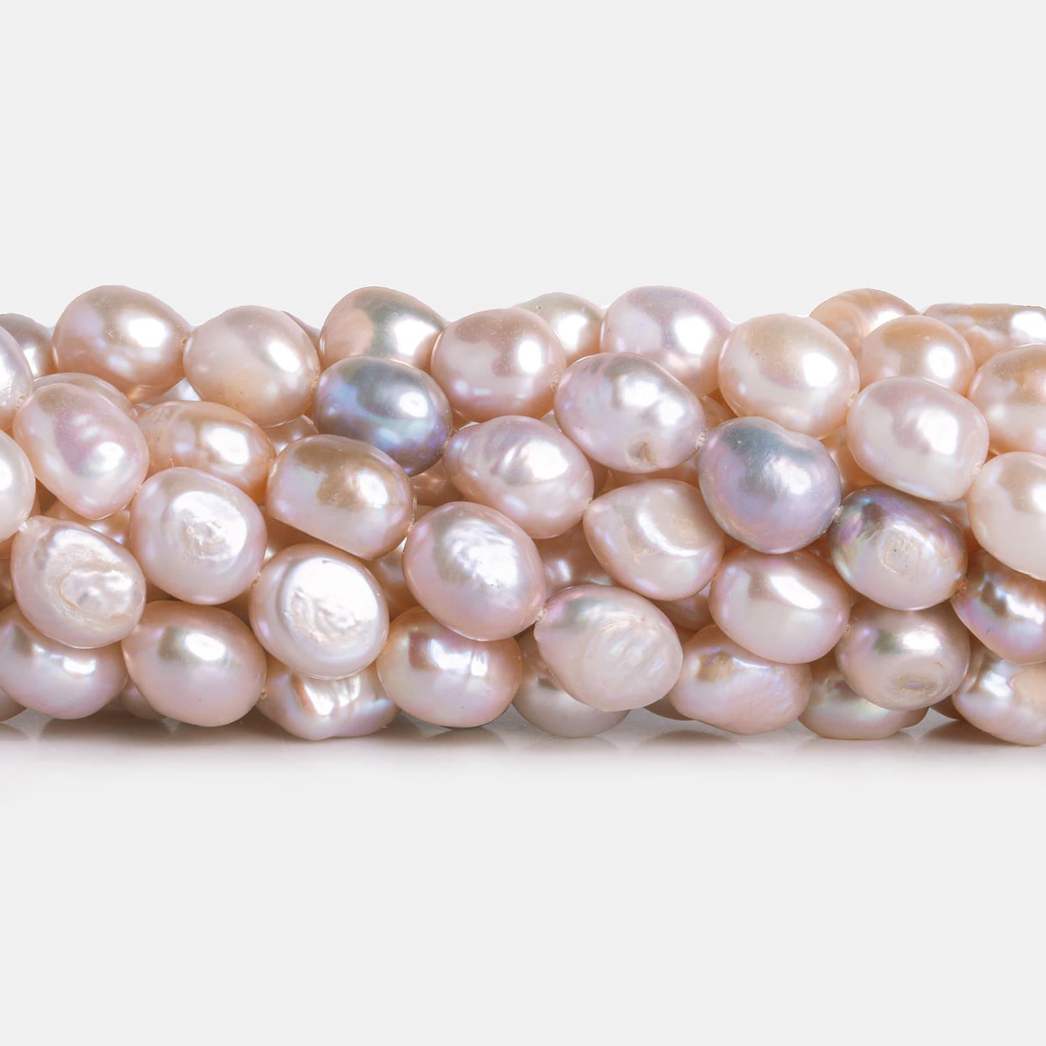 9x7mm Peachy Pink Baroque Pearls 15 inch 40 pieces - The Bead Traders