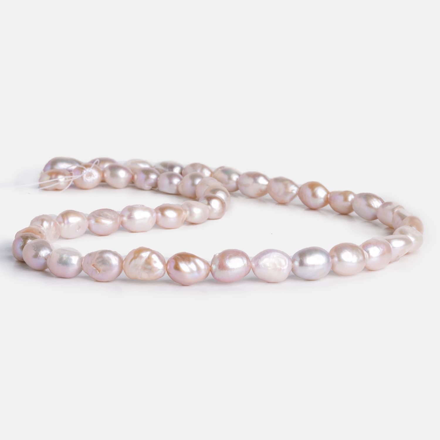 9x7mm Peachy Pink Baroque Pearls 15 inch 40 pieces - The Bead Traders