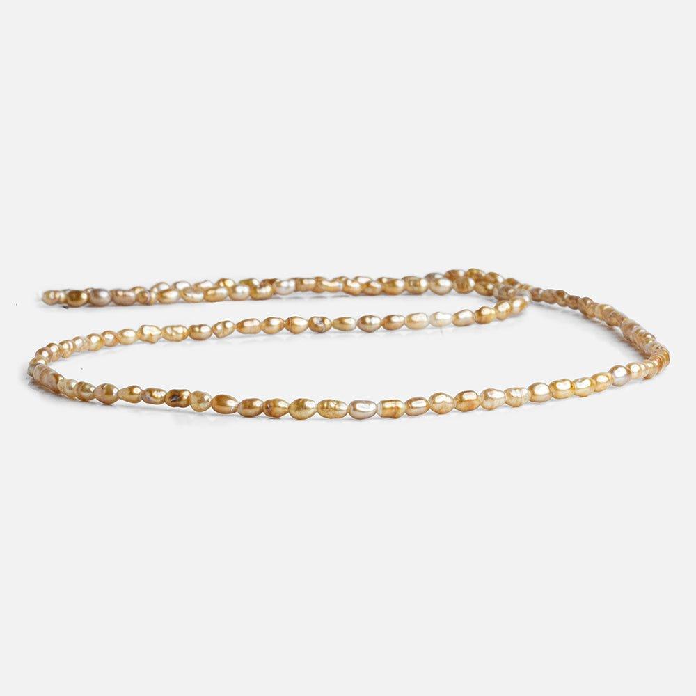 Caramel Petite Oval Freshwater Pearls 15 inch 110 pieces - The Bead Traders