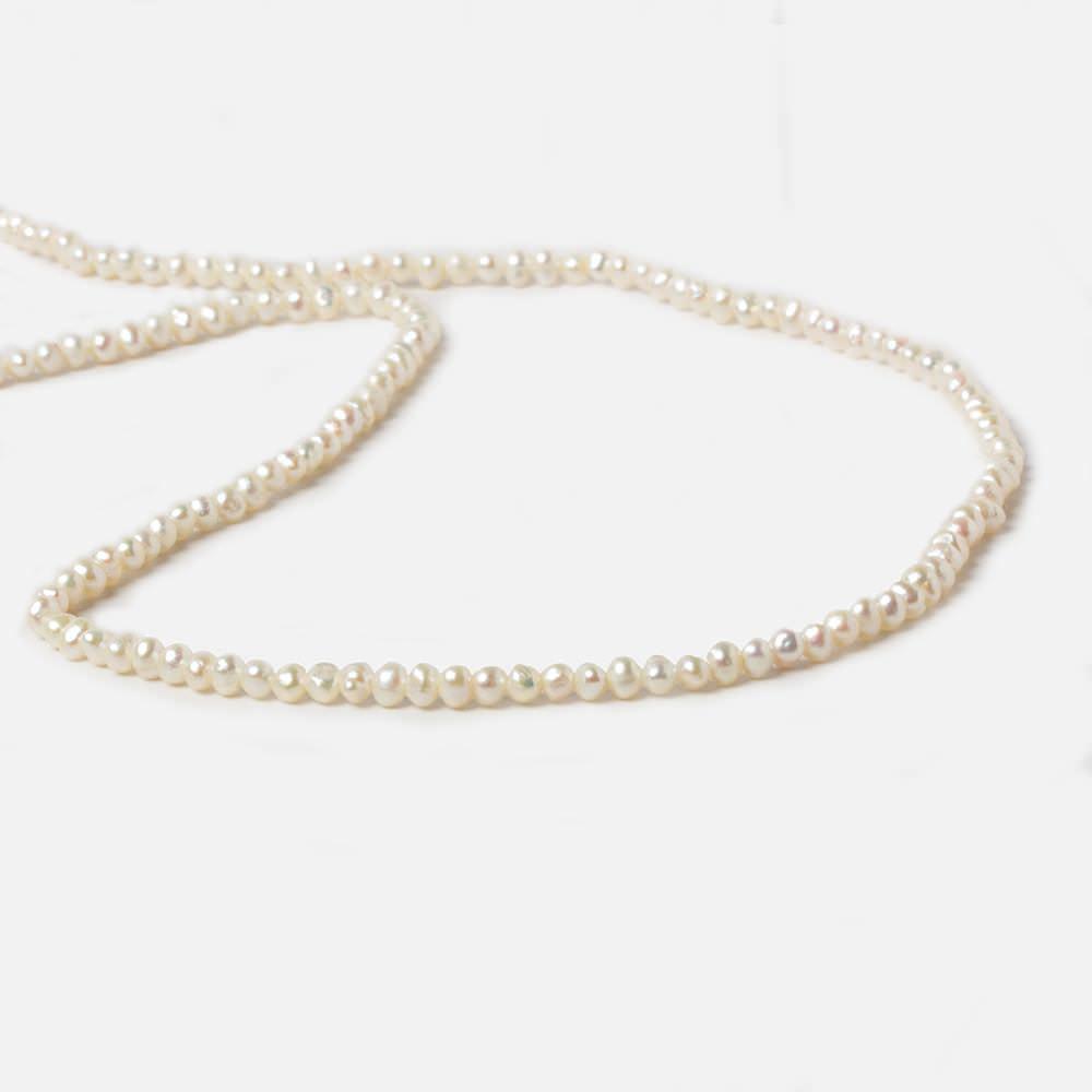 Cream Side Drilled Baroque Freshwater Pearls 16 inch 144 pieces - The Bead Traders