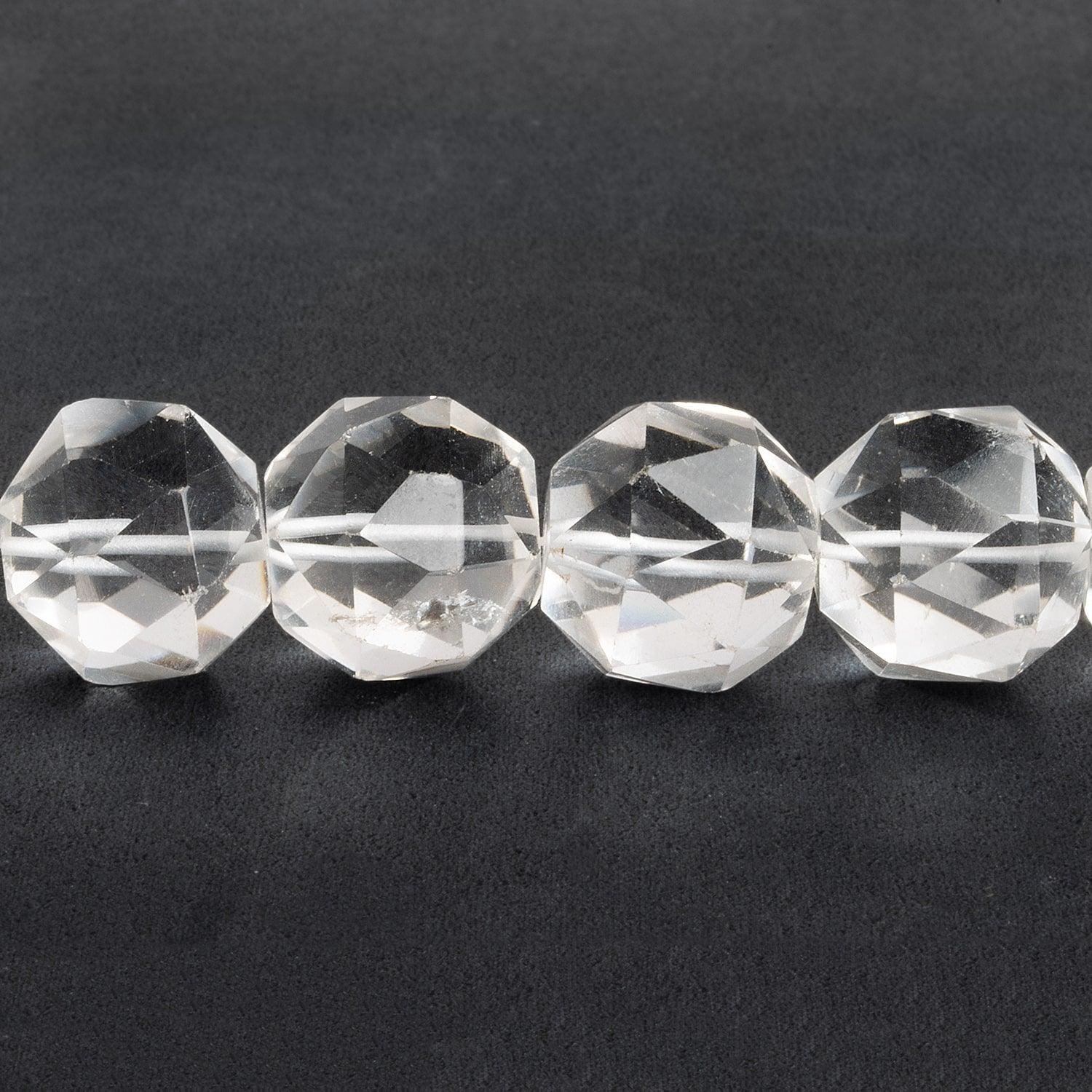 Crystal Quartz Rounded Trillions 14 inch 25 beads - The Bead Traders