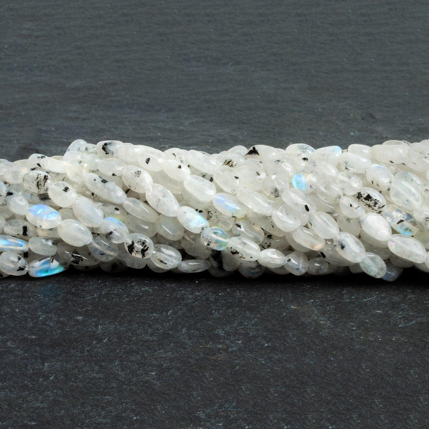 Dalmatian Rainbow Moonstone Ovals 12 inch 35 beads - The Bead Traders