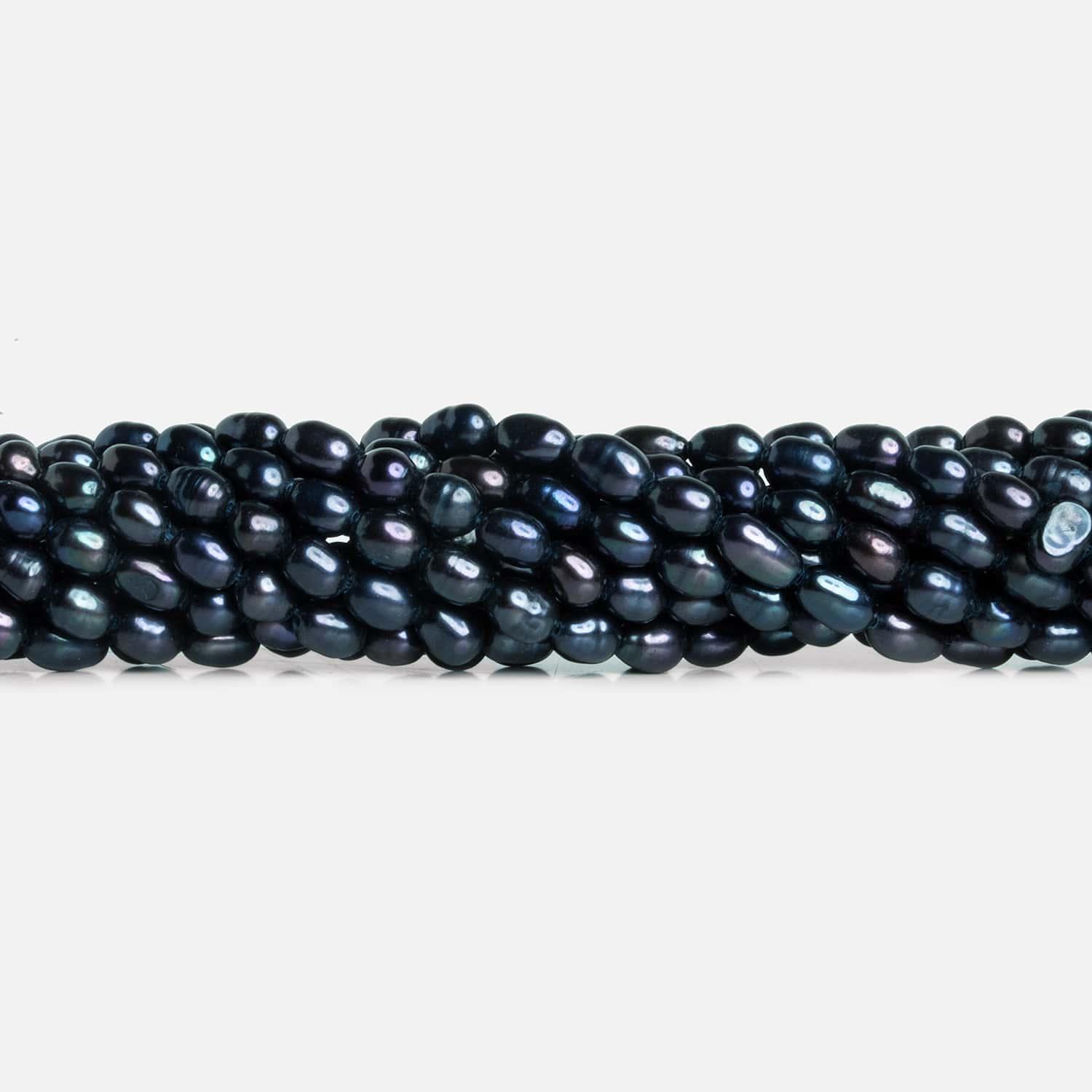 Navy Peacock Oval Freshwater Pearls 15 inch 70 pieces - The Bead Traders