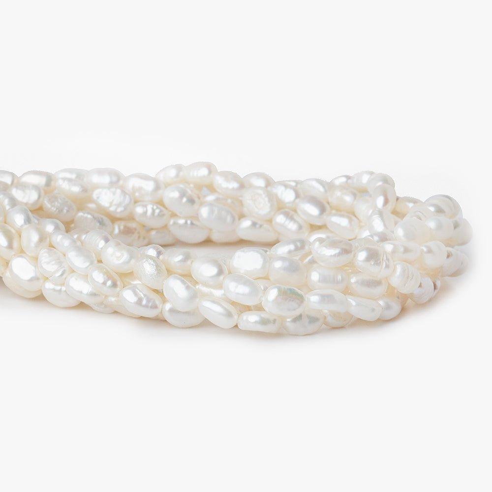 Off White straight drilled Baroque Freshwater Pearl 15 inch 52 beads 5x4-7x4mm - The Bead Traders
