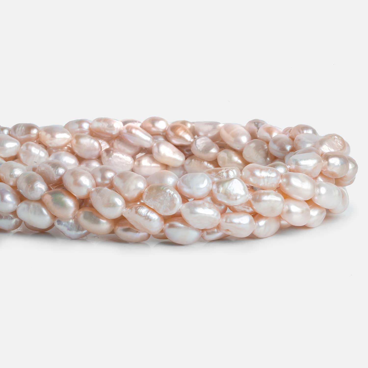 Peach Baroque Freshwater Pearls 15 inch 37 pieces - The Bead Traders