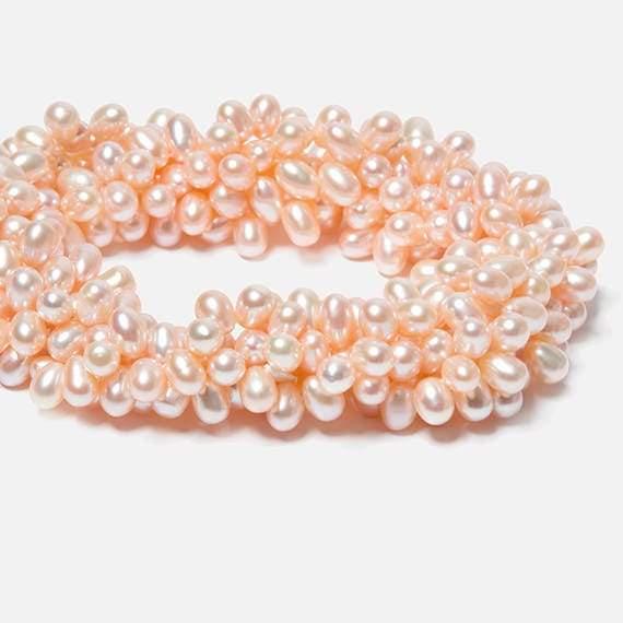 Peach Top Drilled Oval Freshwater Pearls 15.5 inch 90 pcs - The Bead Traders