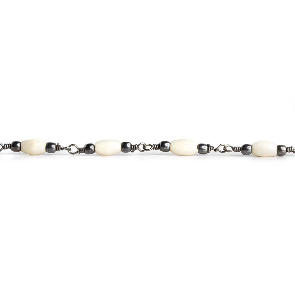 Tan Bone Barrel Black Gold Chain by the Foot 15 pieces - The Bead Traders