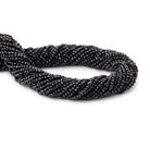 microfacted black round beads