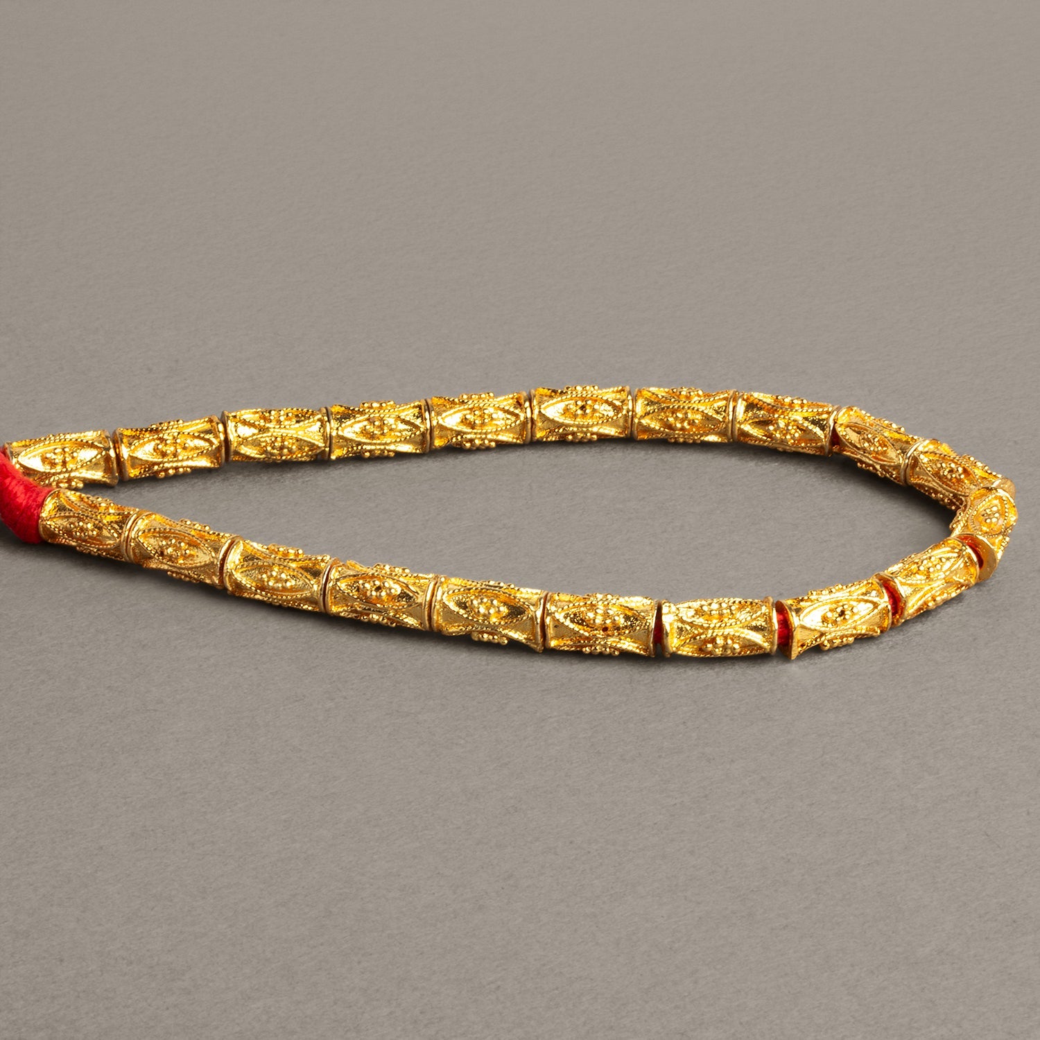 10x6mm 22kt Gold Plated Copper Decorated Tubes 8 inch 20 beads - The Bead Traders
