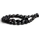 10x7mm Black Spinel Faceted Teardrops 16 inch 39 beads - The Bead Traders