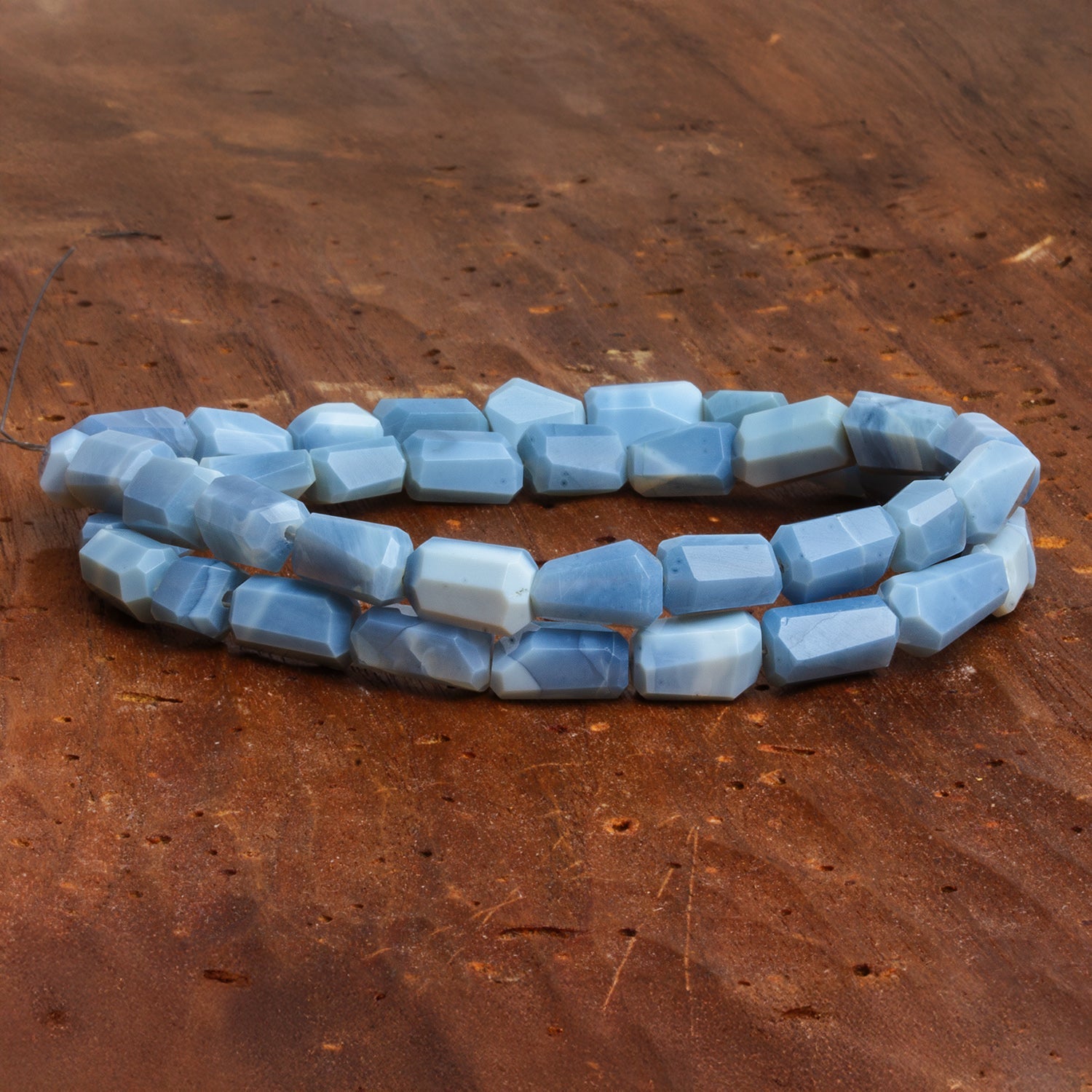 10x7mm Owyhee Denim Opal Faceted Nuggets 16 inch 38 beads - The Bead Traders