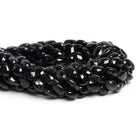 10x8mm Black Spinel Faceted Ovals 14 inch 33 beads - The Bead Traders
