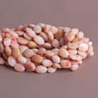 10x8mm Pink Peruvian Opal Faceted Ovals 14 inch 35 beads - The Bead Traders