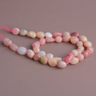 10x8mm Pink Peruvian Opal Plain Nuggets 15 inch 35 beads - The Bead Traders