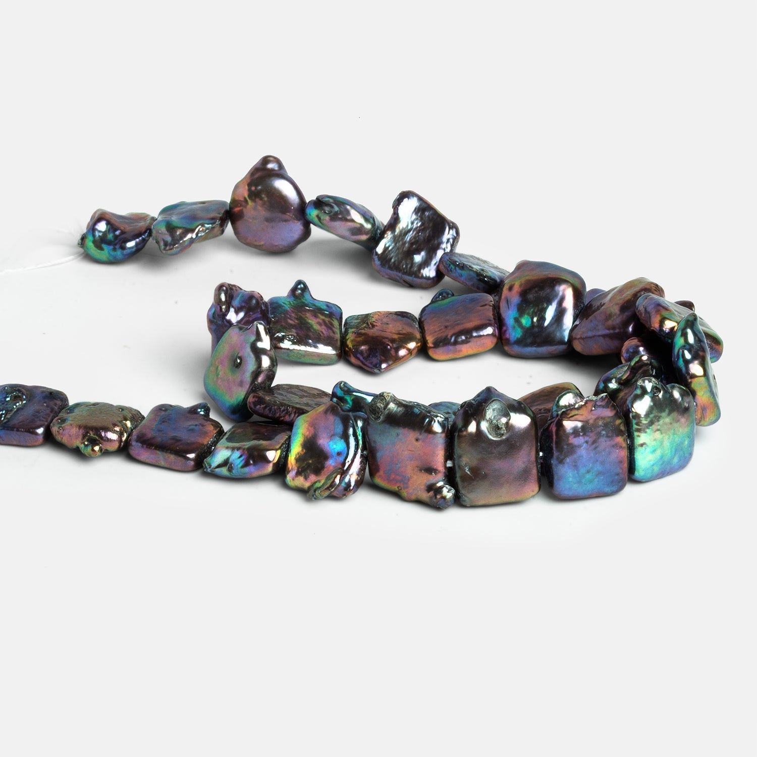 12 - 17mm Peacock Square Pearls 15 inch 31 beads - The Bead Traders