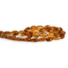 12x7mm Madeira Citrine Plain Oval Nuggets 12 inch 28 beads - The Bead Traders