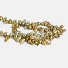 12x8mm Golden Green Keshi Pearls 16 inch 67 beads - The Bead Traders