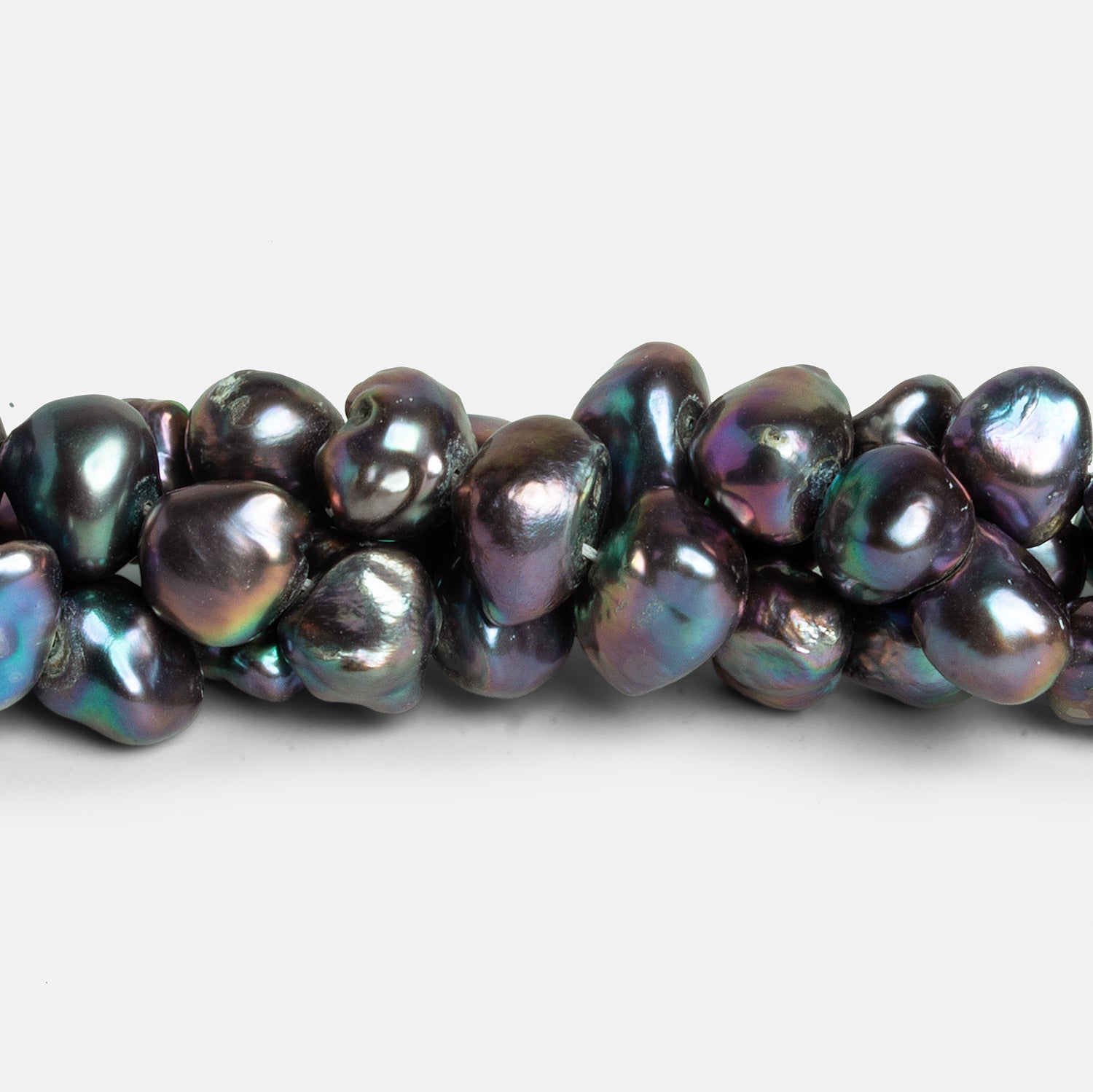 12x8mm Peacock Keshi Pearls 16 inch 45 beads - The Bead Traders