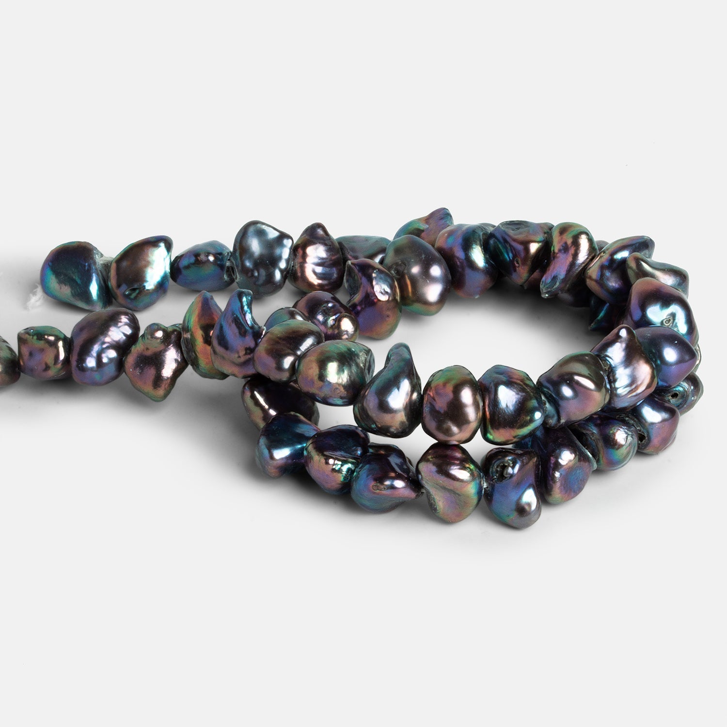 12x8mm Peacock Keshi Pearls 16 inch 45 beads - The Bead Traders