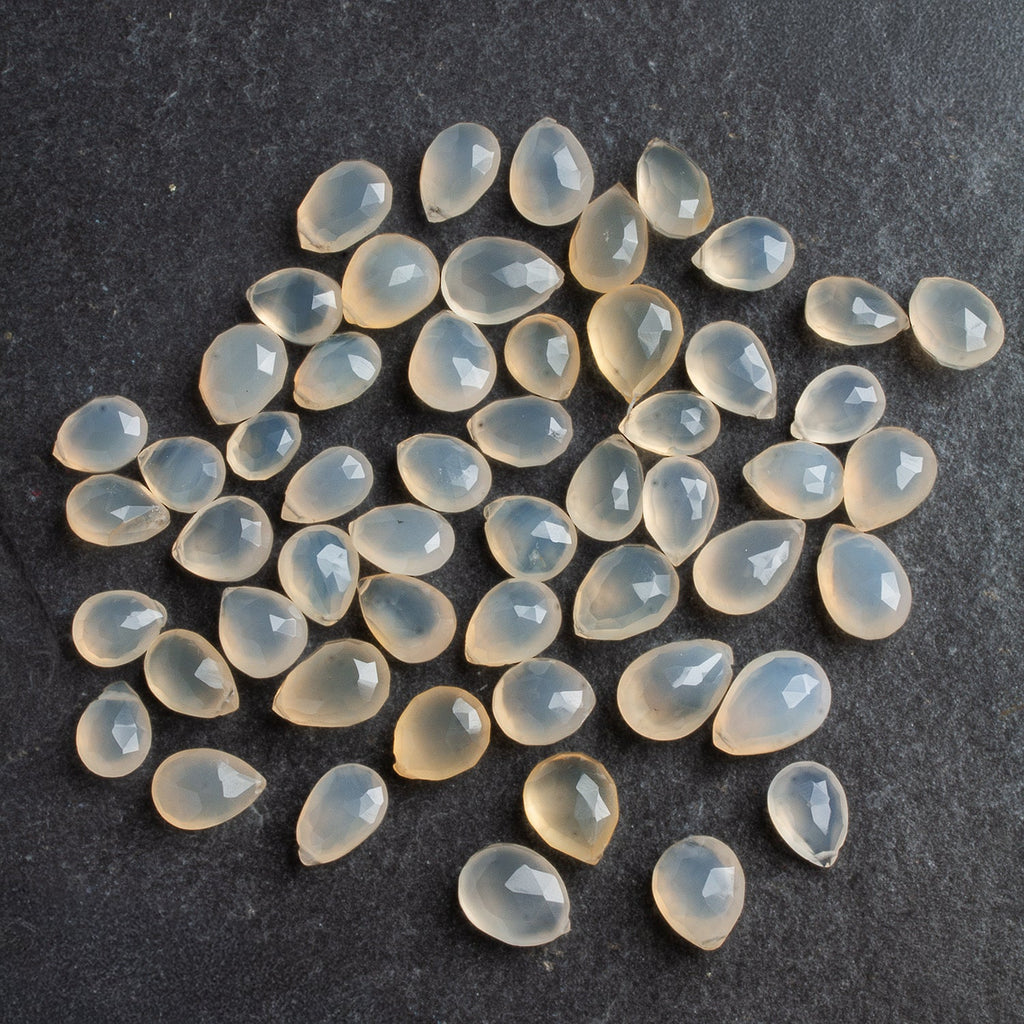 12x9mm Natural Cream Chalcedony Faceted Pears 48 beads - The Bead Traders