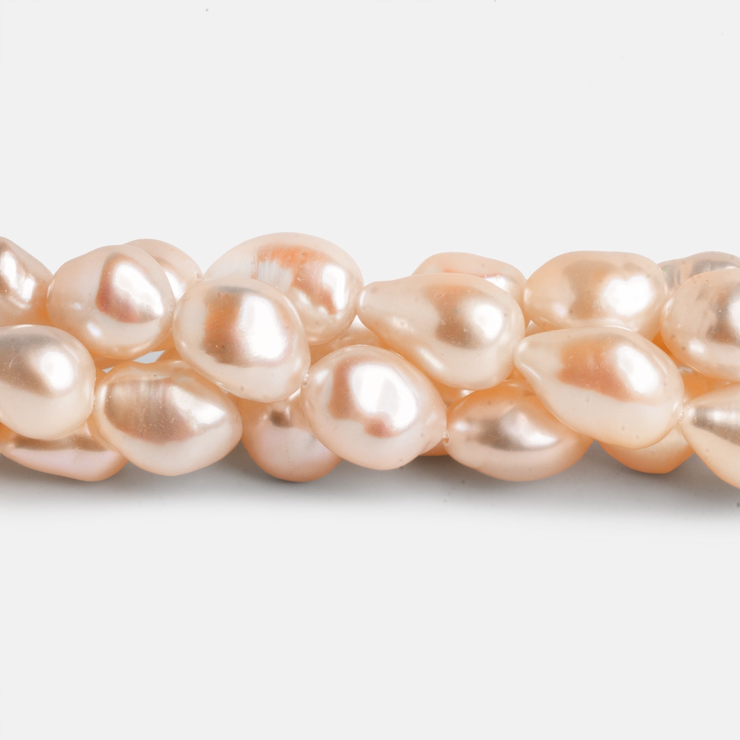 12x9mm Peach Baroque Pearls 15 inch 30 beads - The Bead Traders