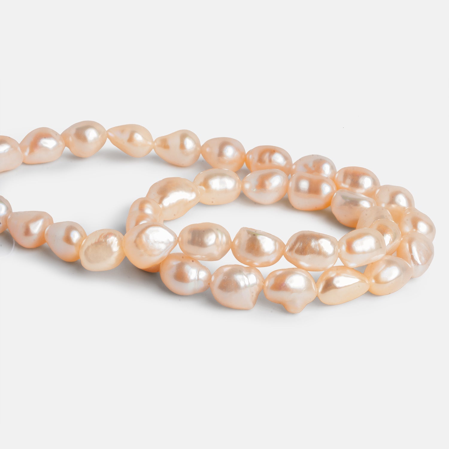 12x9mm Peach Baroque Pearls 15 inch 30 beads - The Bead Traders