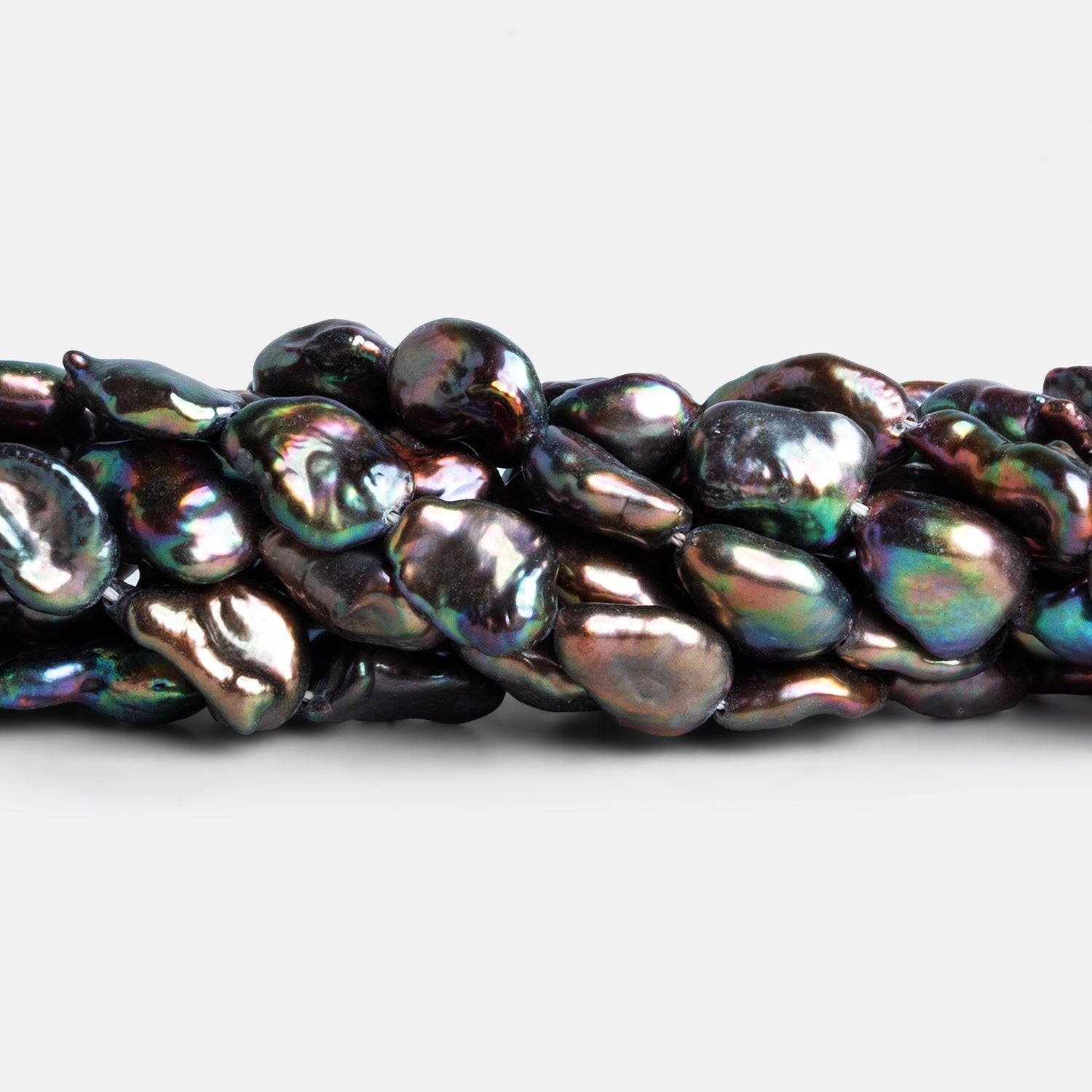 12x9mm Steel Peacock Keshi Pearls 15 inch 32 beads - The Bead Traders