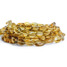 13x10mm Whisky Quartz Plain Ovals 16 inch 33 beads - The Bead Traders